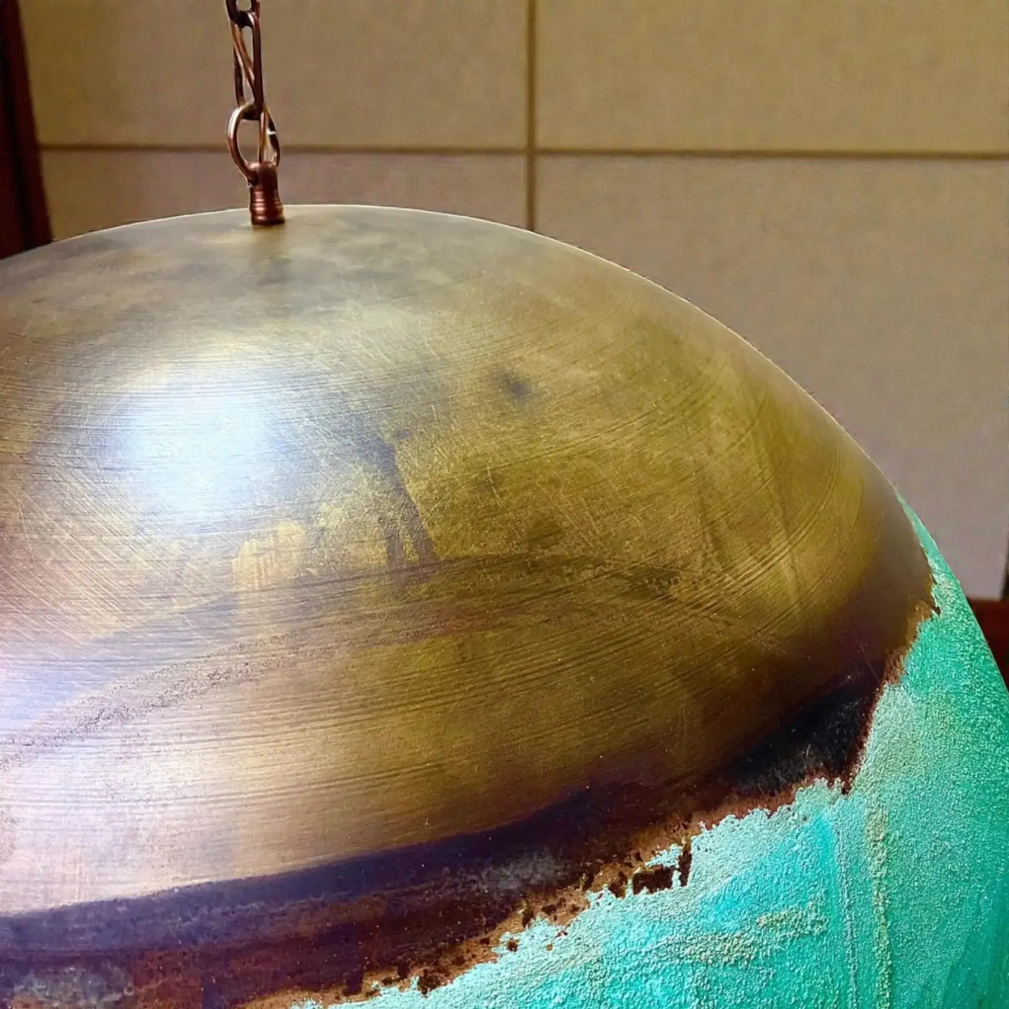 Close-up of a Copper Dome Pendant Light showcasing its unique finish and texture.