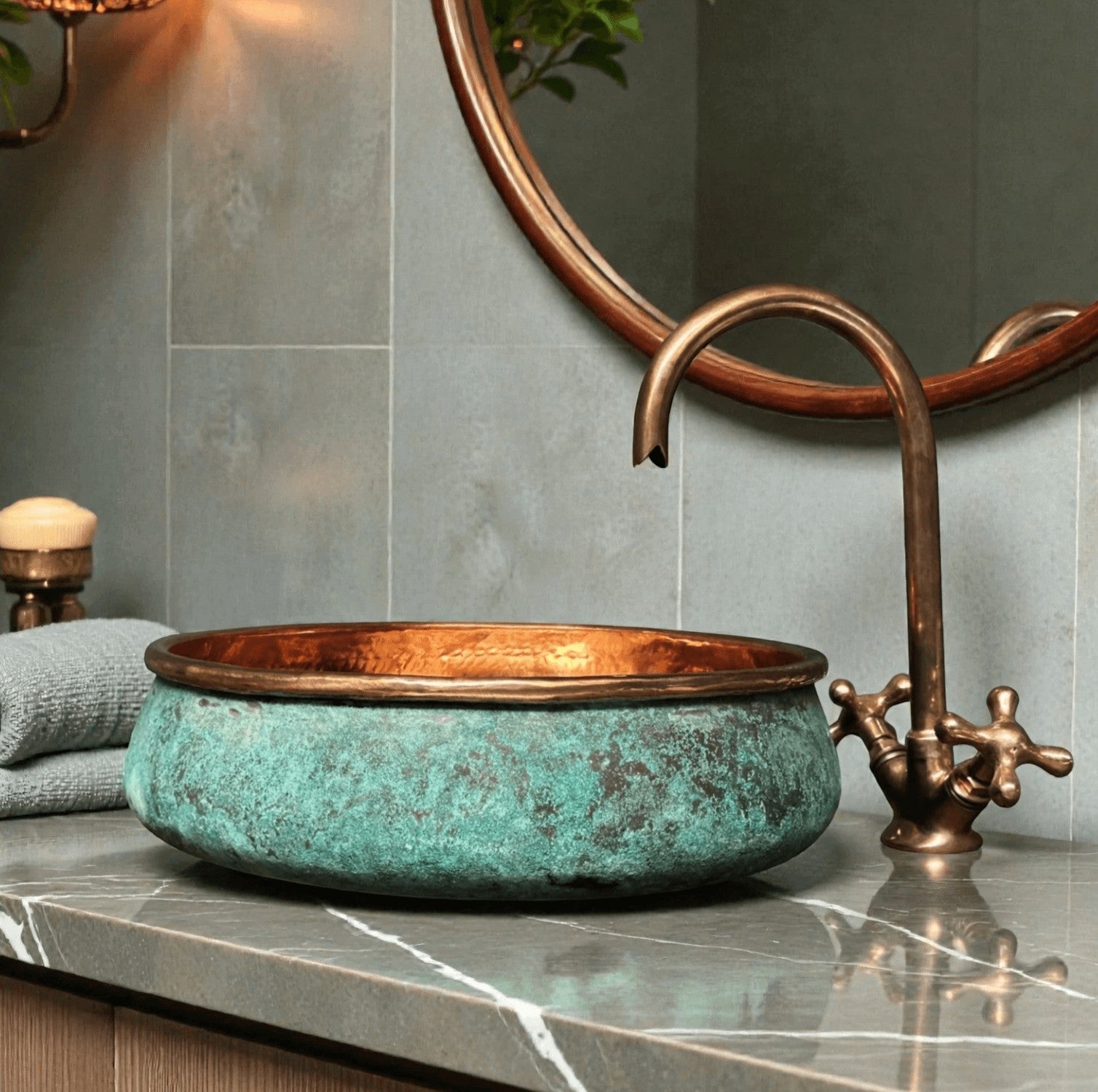 two tone green patina copper vessel sink with hammered design and bronze faucet in modern bathroom setting