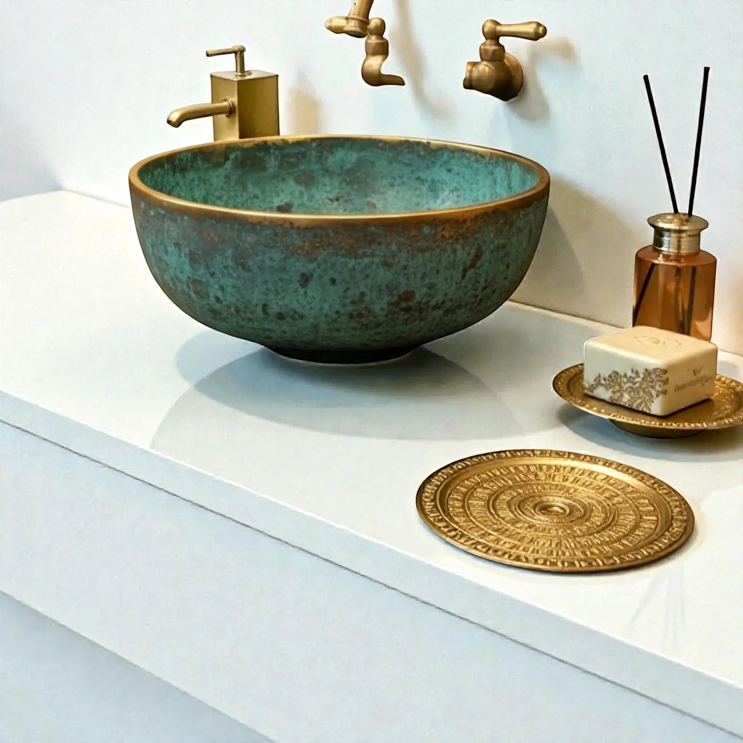 hammered copper vessel sink displayed on a modern countertop with decorative accessories and stylish faucet.